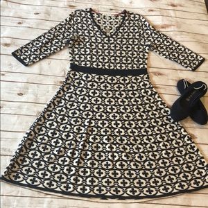 A line navy and white patterned knit dress